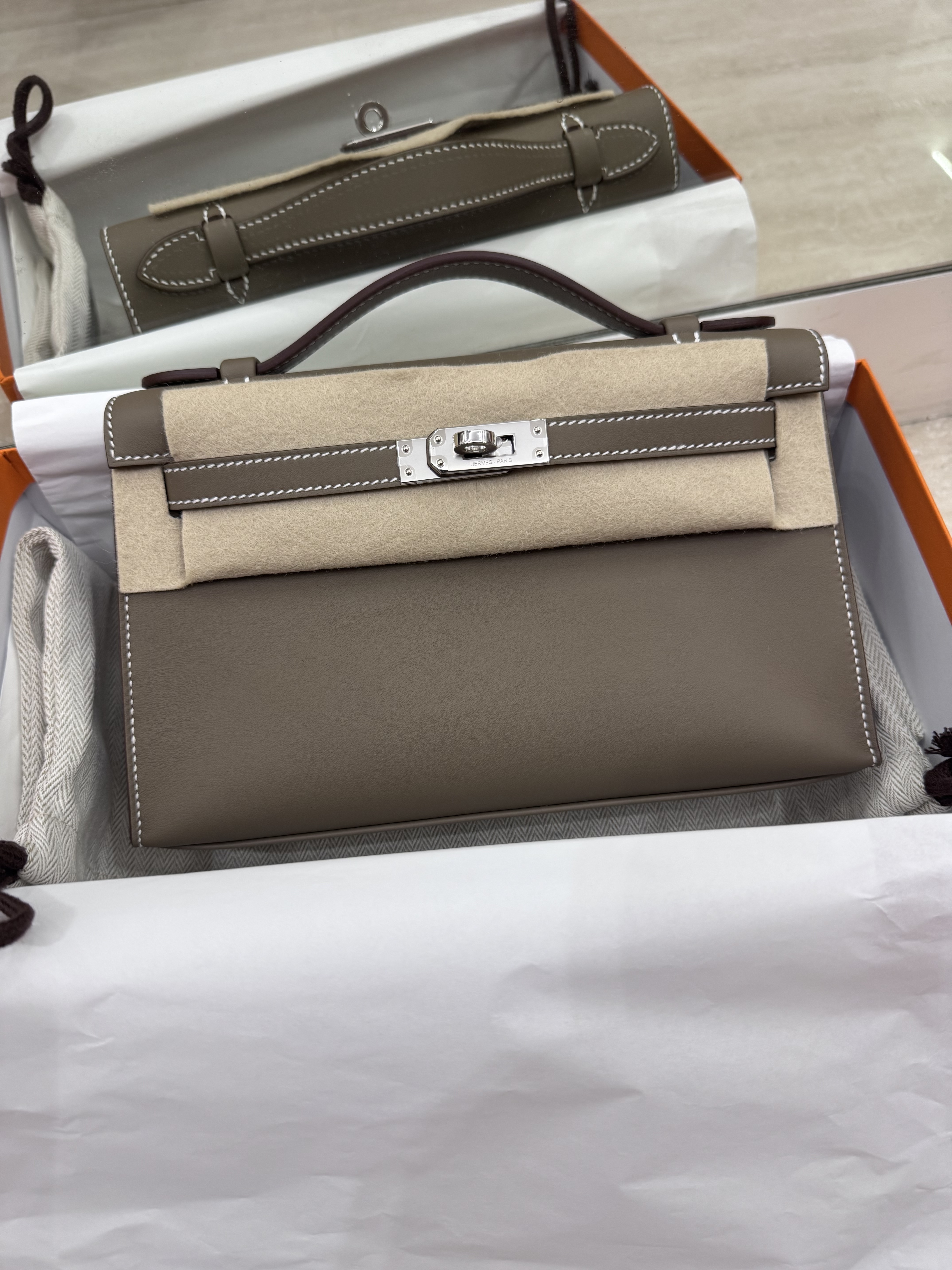 Kelly Pochette 18 etoupe ck swift G