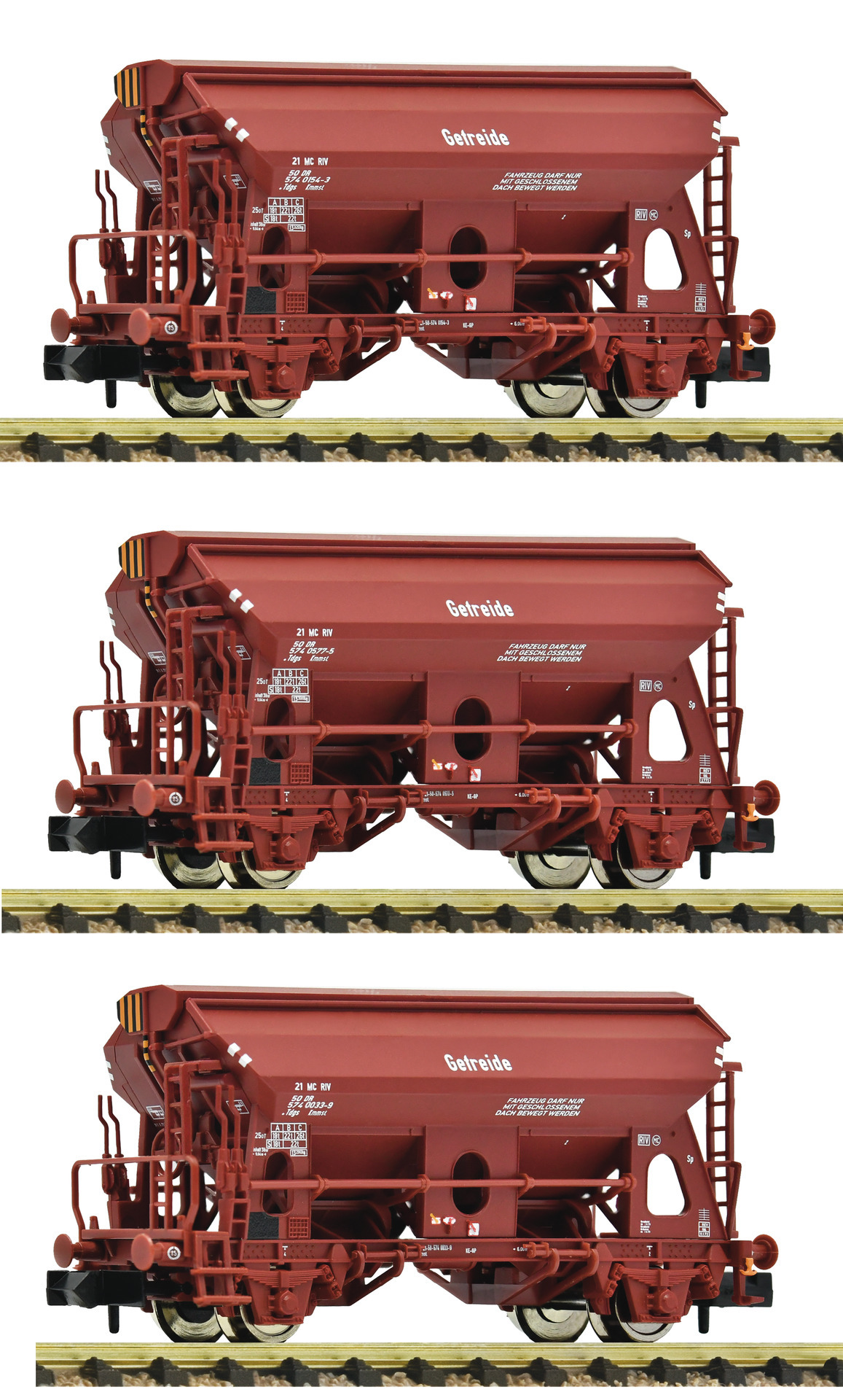 Fleischmann 6660071 N scale 3 piece set: Swivel roof wagons, DR