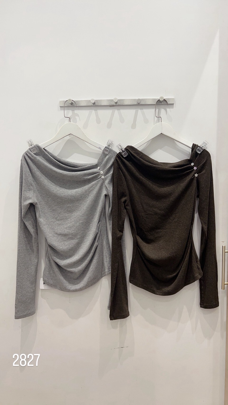 Waist-cinching asymmetric-neck top