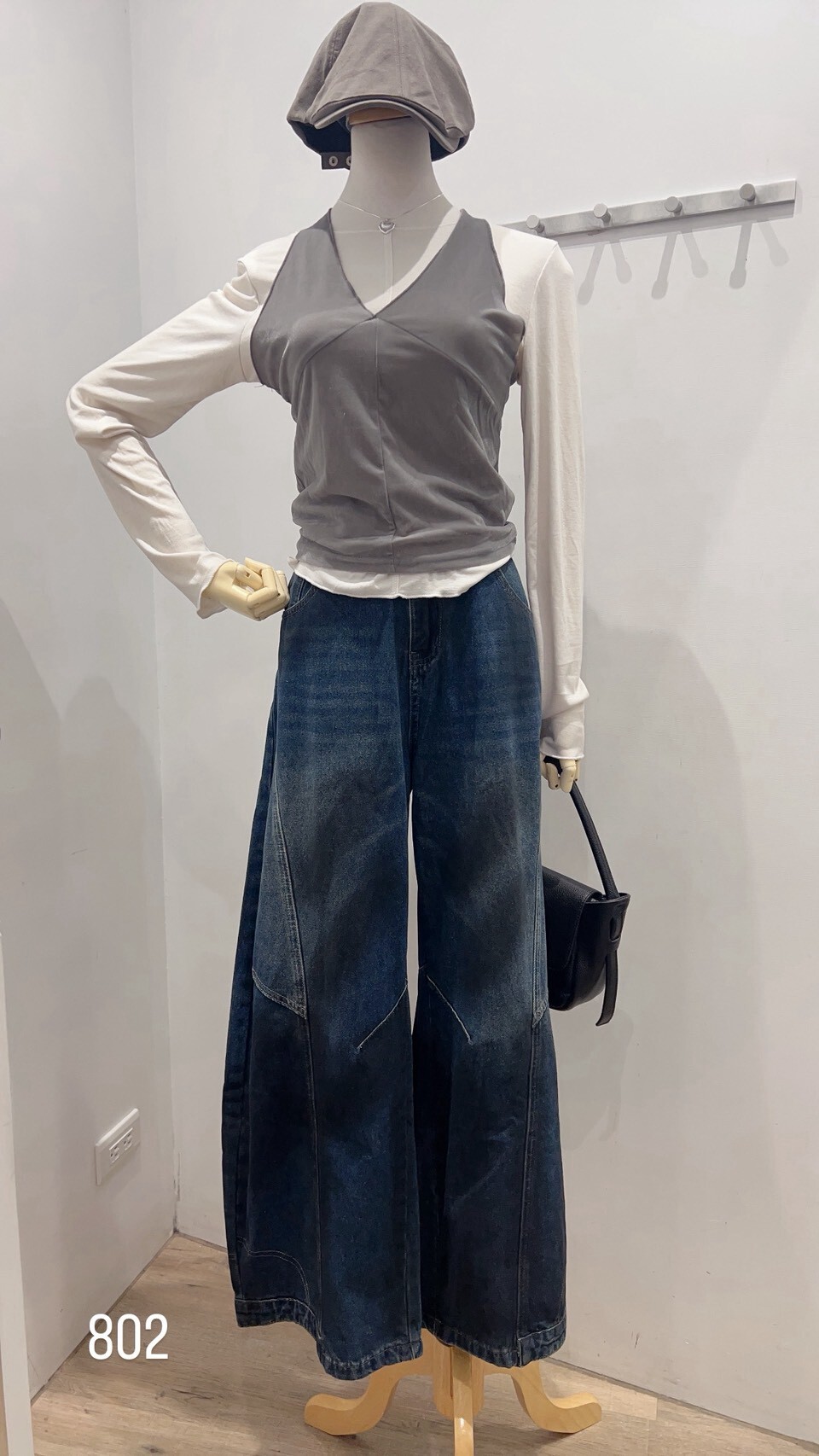 Dark-wash curved-seam jeans