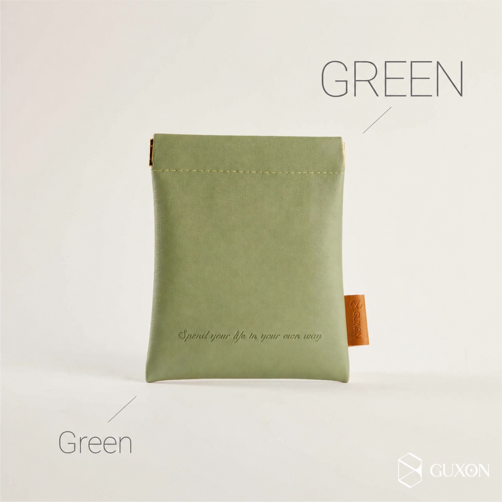 Green colourway of the GUXON leather storage pouch
