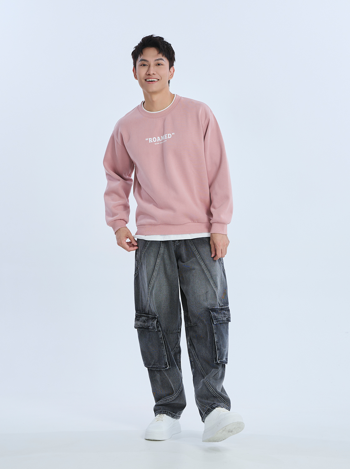 弧線拼接彎刀牛仔褲