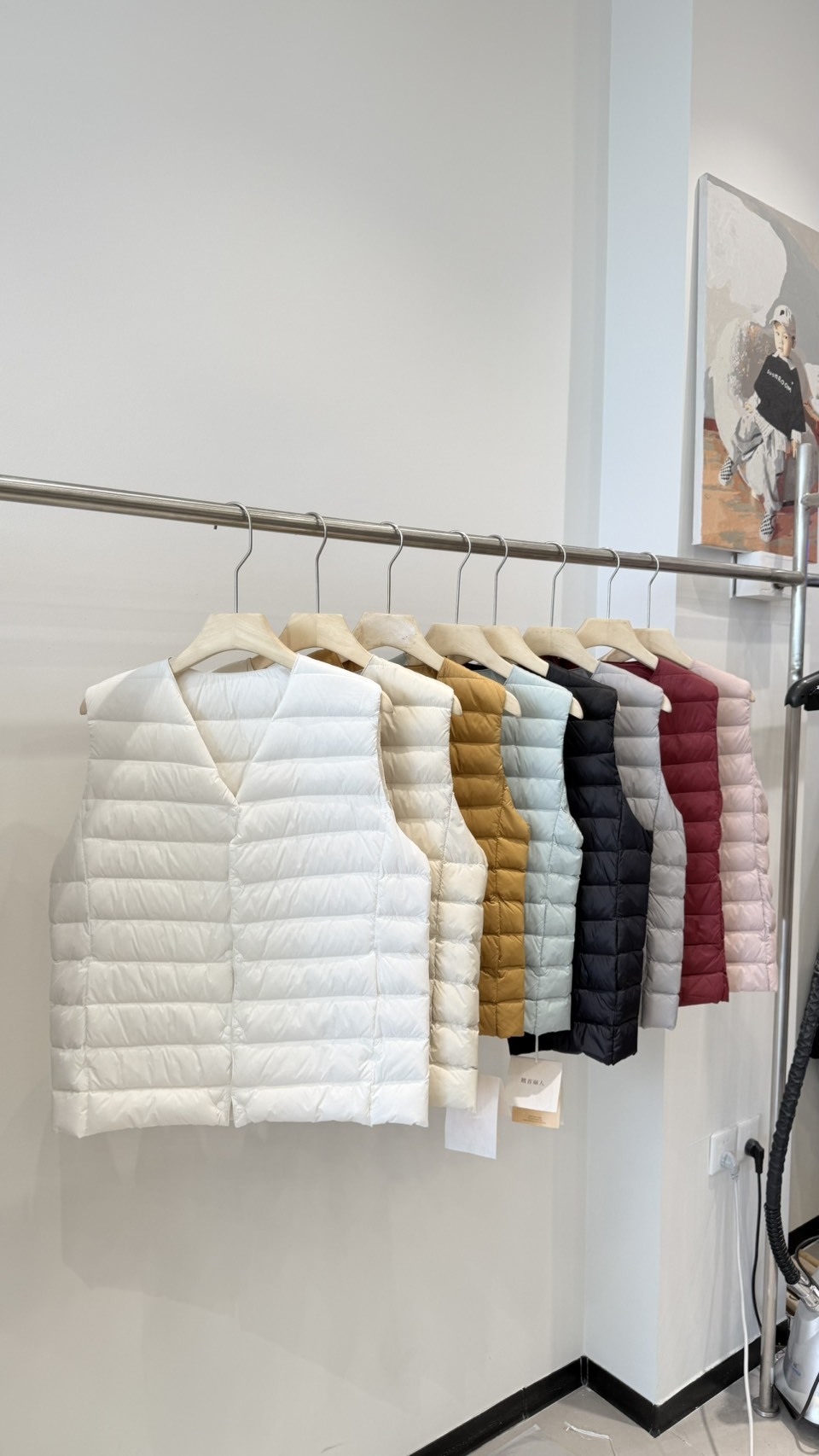 IF676-壓釦羽絨背心(白鴨絨50%)