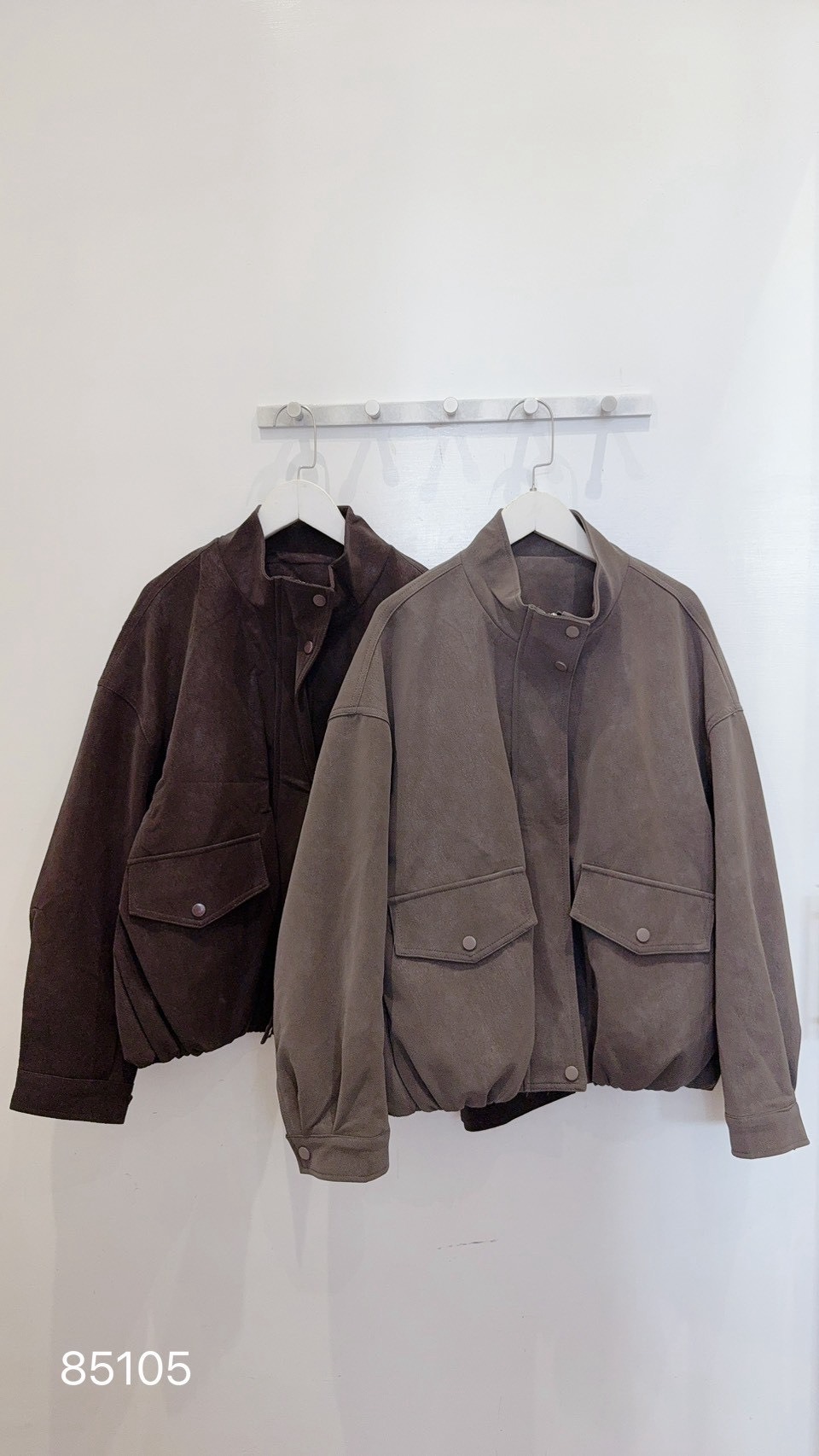 Shop girl keeps her suede jacket