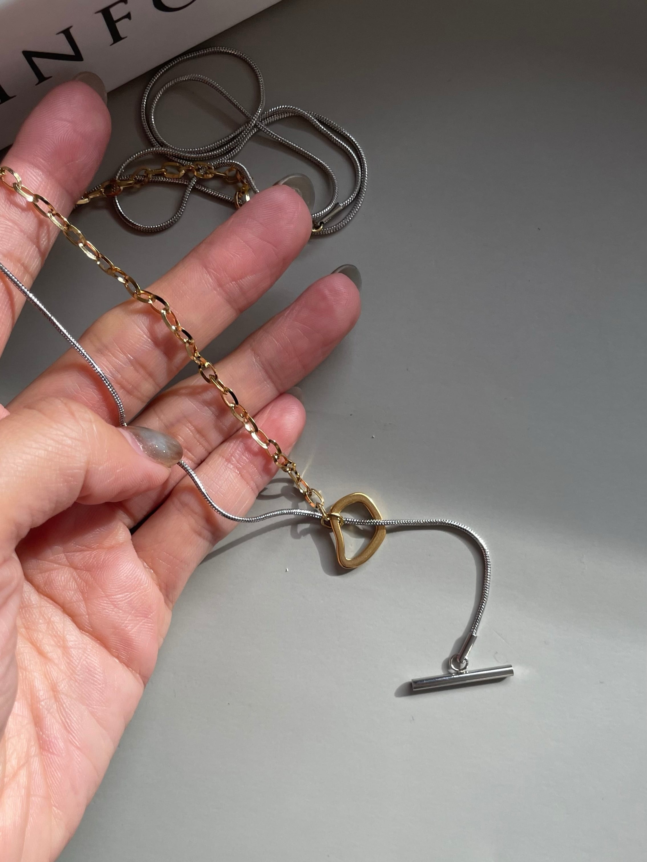 two tone switch layer necklace